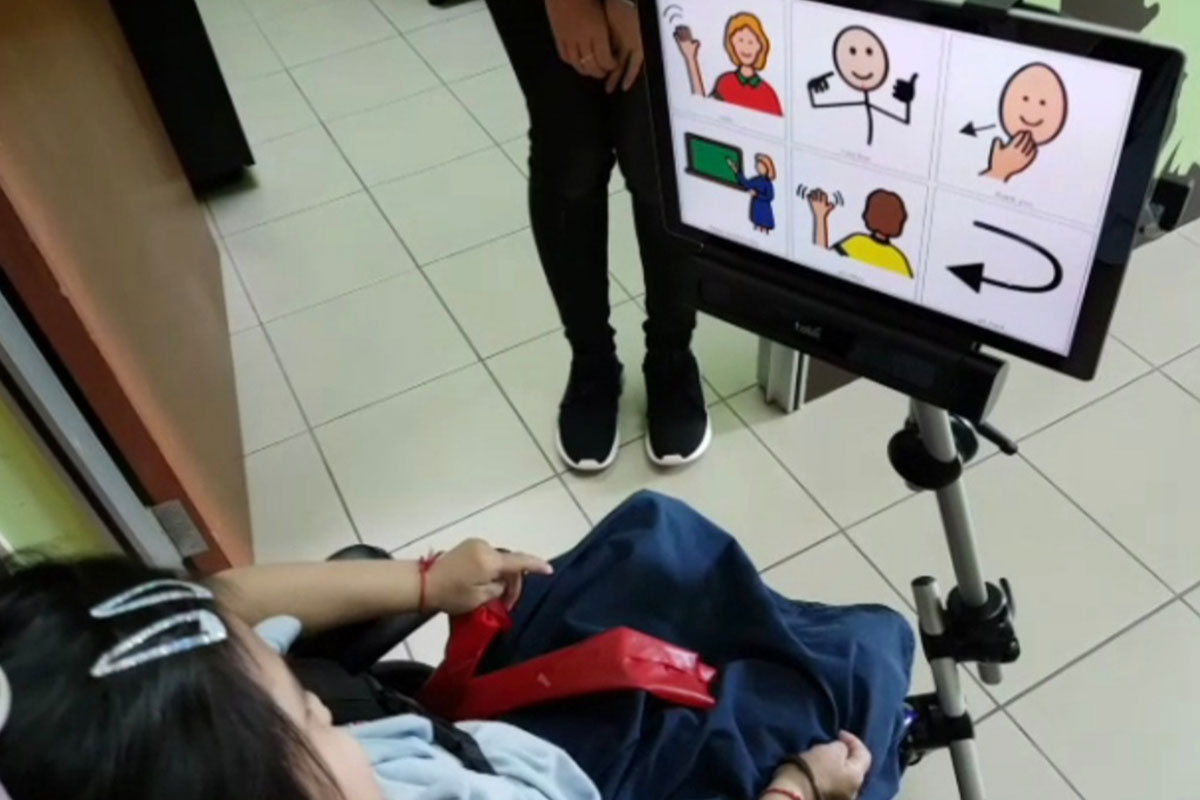 A girl watching a screen