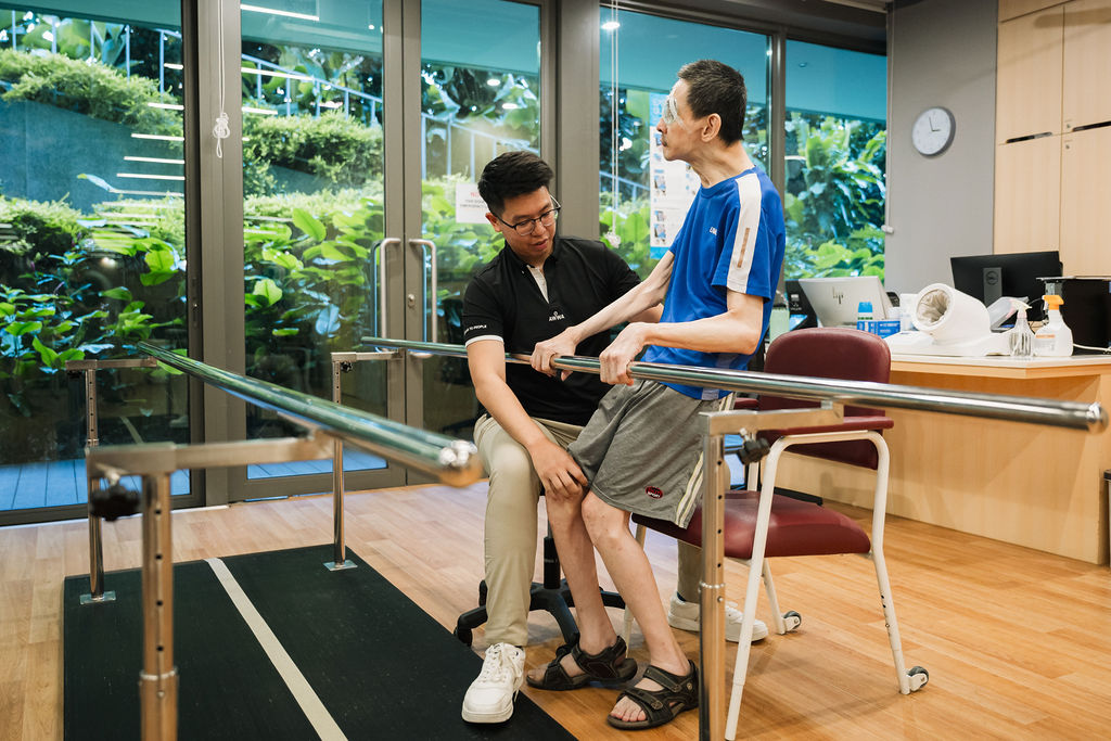 AWWA staff member standing with an elderly participant